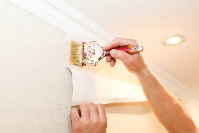 Pose de papier peint à Cunfin — revêtements muraux et toiles de verre
